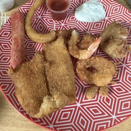 Flounder, shrimp, crab stick and onion rings. Flounder, shrimp, crab stick and onion rings.
