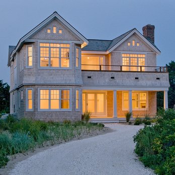 Old Harbor Homes - the front of the house at dusk - General Contractors Near Me - North Chatham, Massachusetts Old Harbor Homes - the front of the house at dusk - General Contractors Near Me - North Chatham, Massachusetts