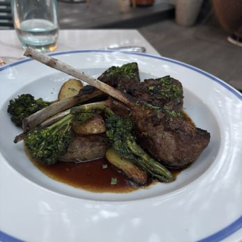 Kipos Hellenic Cuisine - Lamb chops with broccolini - Greek Near Me - Wilmington, North Carolina Kipos Hellenic Cuisine - Lamb chops with broccolini - Greek Near Me - Wilmington, North Carolina
