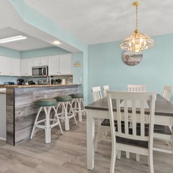 Luxury Vinyl Plank In Dining Room & Front of Counter