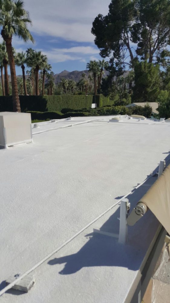 Slide of Foam Bond-A Quality Roofing