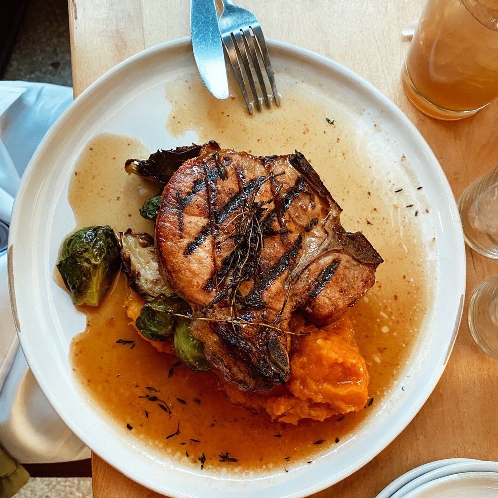 District Kitchen & Bar - Grilled Pork Porterhouse - New American Near Me - Pittsfield, Massachusetts District Kitchen & Bar - Grilled Pork Porterhouse - New American Near Me - Pittsfield, Massachusetts