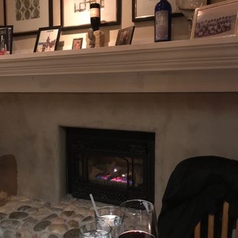 The Bistro On 2nd - Corner table by the fireplace - New American Near Me - Monument, Colorado