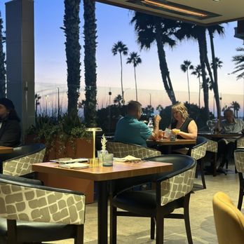 Lorea - View of the sun setting - Seafood Near Me - Huntington Beach, California
