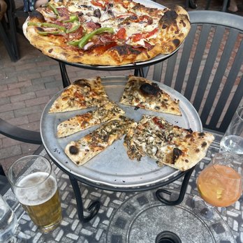 American Flatbread - Tiered pizzas. Each a half to try different kinds. - Pizza Near Me - Burlington, Vermont American Flatbread - Tiered pizzas. Each a half to try different kinds. - Pizza Near Me - Burlington, Vermont