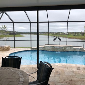 Agua Pools - Beautiful pool with raised wall waterfall we built for a home in St. Augustine - Pool & Hot Tub Service Near Me - Daytona Beach, Florida