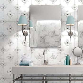 Designer's Tile - a bathroom with two sinks and a mirror - Flooring Near Me - Coral Gables, Florida Designer's Tile - a bathroom with two sinks and a mirror - Flooring Near Me - Coral Gables, Florida