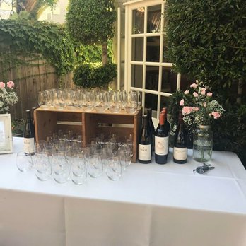 Laurel & Fey - The super cute wine table setup by Lauren and her assistants at our backyard wedding. - Wedding Planning Near Me