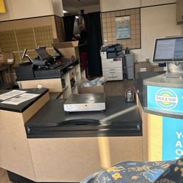 There were 6 people sitting in the back behind the curtain all seemingly "on break"