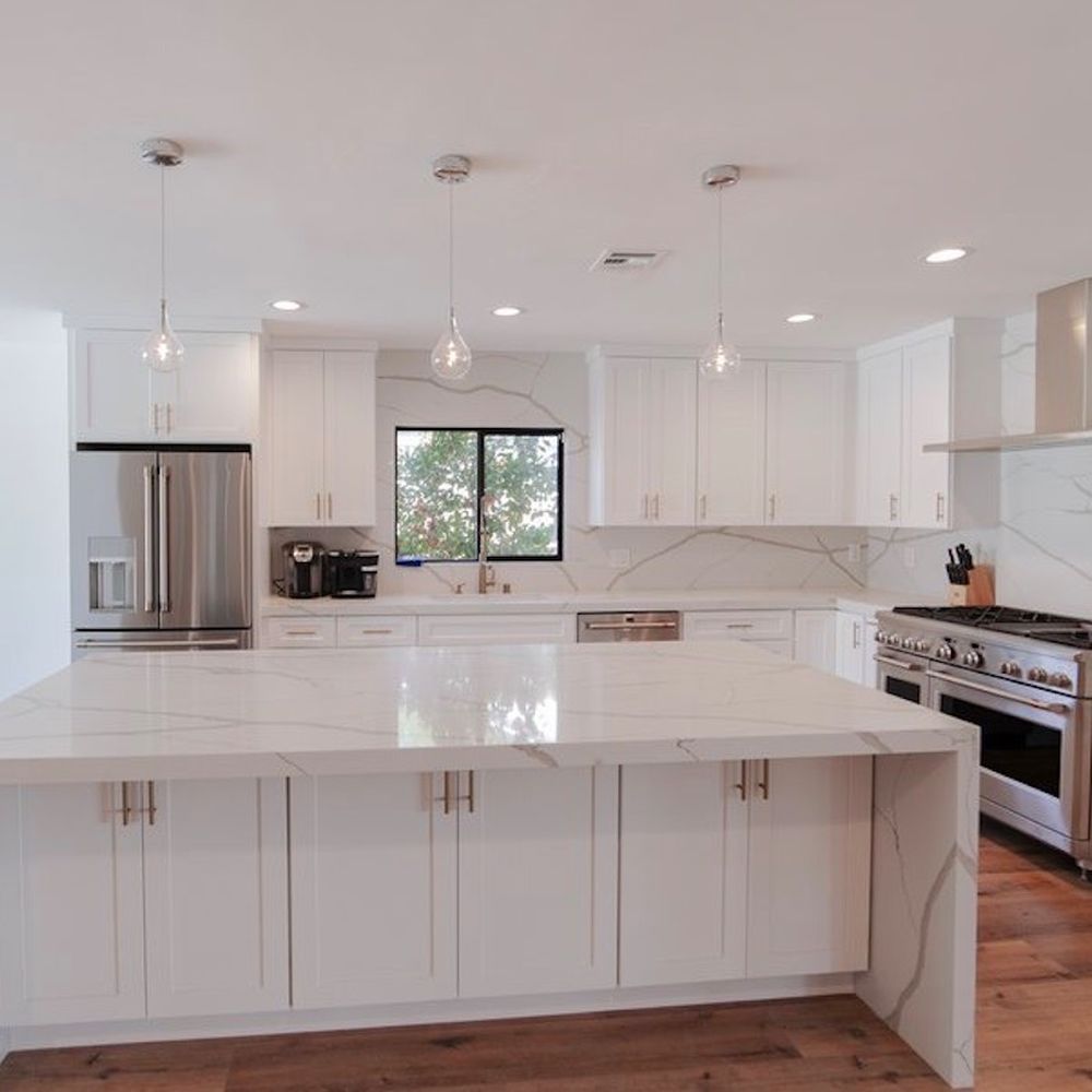 Amazon Construction - a large kitchen with a center island - Kitchen & Bath Near Me - Pleasanton, California