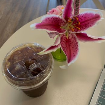 Crema and Bloom - iced americano w/ sf brown sugar cinnamon syrup that came with a chocolate covered espresso bean! - Coffee & Tea Near Me - Springfield, Oregon