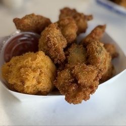 Moby Dick Seafood Jeffersonville - Fried oysters and a hushpuppy.