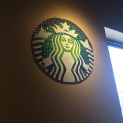 Starbucks - Cool Starbucks mural made of bottle tops