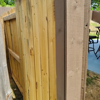 River Construction - a fence with a wooden gate - General Contractors Near Me - Columbiana, Alabama River Construction - a fence with a wooden gate - General Contractors Near Me - Columbiana, Alabama