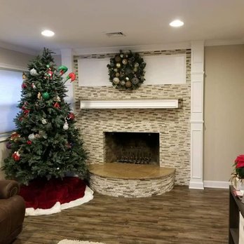 Tile Maniacs - a christmas tree in a living room - General Contractors Near Me - Selden, New York Tile Maniacs - a christmas tree in a living room - General Contractors Near Me - Selden, New York