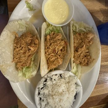 Bernie’s Brother - Chicken tacos with normal sides, beans and rice - Bars Near Me - Corolla, North Carolina