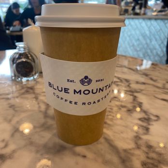 Blue Mountain Coffee Roasters - Hot white chocolate latte to go - Coffee & Tea Near Me - Suwanee, Georgia Blue Mountain Coffee Roasters - Hot white chocolate latte to go - Coffee & Tea Near Me - Suwanee, Georgia