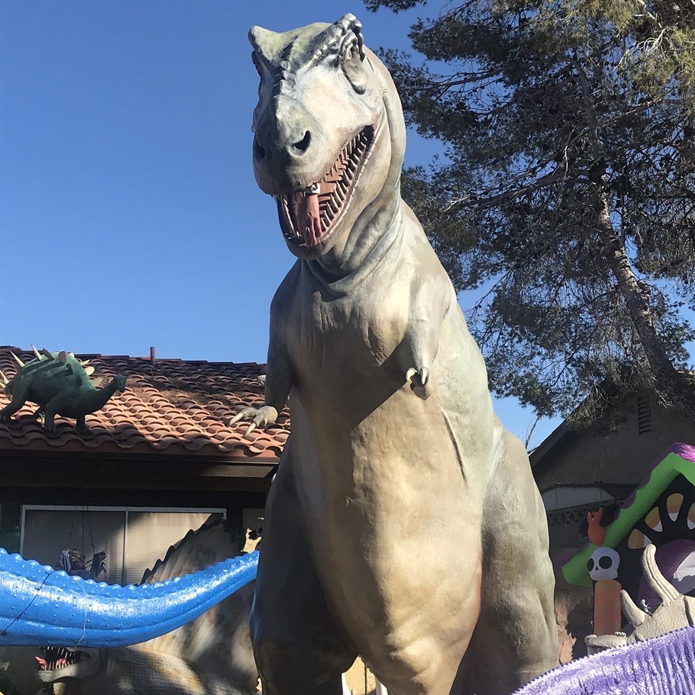 Shan-Gri-La Prehistoric Park - T-Rex with an arm or leg in his mouth - Museums Near Me - Henderson, Nevada Shan-Gri-La Prehistoric Park - T-Rex with an arm or leg in his mouth - Museums Near Me - Henderson, Nevada
