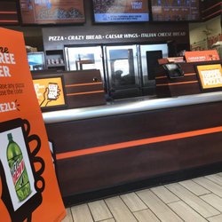 Li'l Cricket Store 334 - The lobby of lil Caesar's pizza