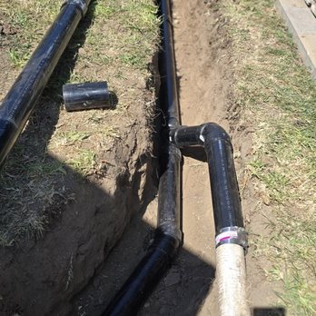 Orange County Drains & Sewer Services - This shows the drainage piping in my front yard that they installed-angled downward, tied in to the existing piping, trenched to the street. - Plumbing Near Me Orange County Drains & Sewer Services - This shows the drainage piping in my front yard that they installed-angled downward, tied in to the existing piping, trenched to the street. - Plumbing Near Me