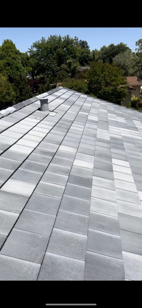 Slide of East Bay Roofing