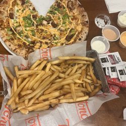 Tono Pizzeria + Cheesesteaks - Buffalo chicken pizza and fries