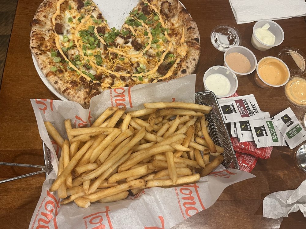 Tono Pizzeria + Cheesesteaks Logo