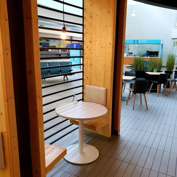 urban acre - a dining area with a table and chairs - Coffee & Tea Near Me - Saskatoon, Saskatchewan urban acre - a dining area with a table and chairs - Coffee & Tea Near Me - Saskatoon, Saskatchewan
