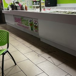 sweetFrog Premium Frozen Yogurt - Cashiers head down like wtf?