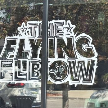The Flying Elbow - Window signage - Hot Dogs Near Me - Marshalltown, Iowa The Flying Elbow - Window signage - Hot Dogs Near Me - Marshalltown, Iowa