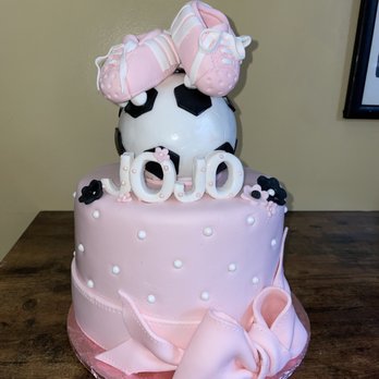 Triple J's Sweets - a pink cake with a cow topper - Desserts Near Me