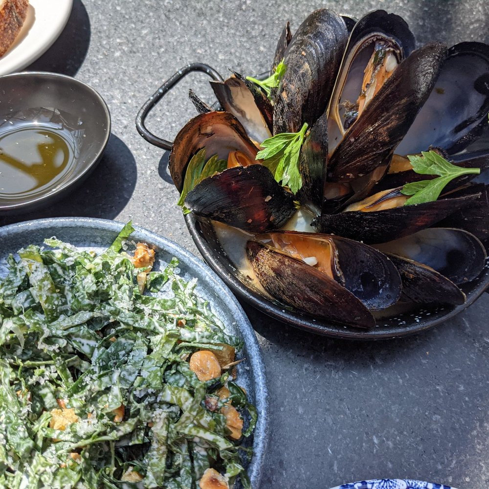La Bodega - Roasted mussels and kale salad - Spanish Near Me - Watertown, Massachusetts La Bodega - Roasted mussels and kale salad - Spanish Near Me - Watertown, Massachusetts