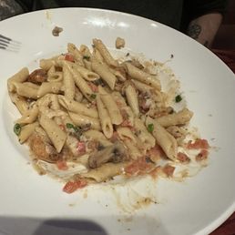 Cajun pasta being devoured Cajun pasta being devoured