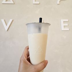 OMOMO Tea Shoppe - Osmanthus Oolong Milk Tea - no ice and 50% sugar. So good!
