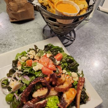 Andy's - Octopus Salad - exceeded our expectations. Large and generous portion. Loveit!!! - Gastropubs Near Me - Greenport, New York Andy's - Octopus Salad - exceeded our expectations. Large and generous portion. Loveit!!! - Gastropubs Near Me - Greenport, New York
