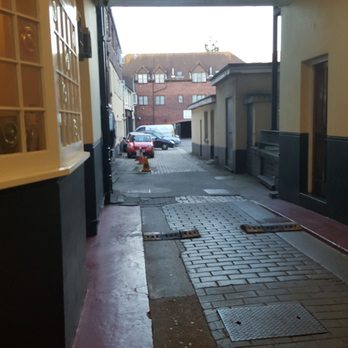 The Star Hotel - The entrance is an old stage coach and the parking lot is lined with cobble stones. - Hotels Near Me - Southampton, HAM