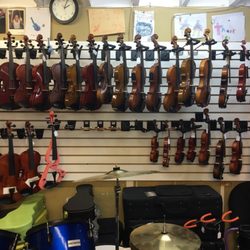 Dale's Guitar - This is our Violin and Fiddle wall!