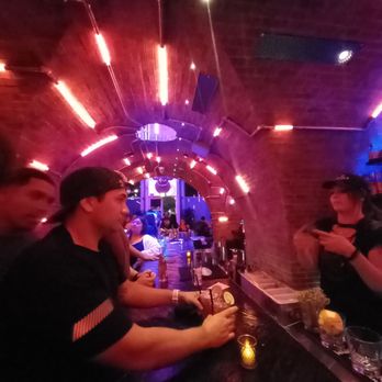 Devil's Hideaway - At the bar, feels like an underground tunnel - Wine Bars Near Me - Tempe, Arizona