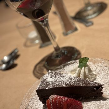 Humboldt Bay Bistro - a piece of chocolate cake and strawberries - New American Near Me - Eureka, California Humboldt Bay Bistro - a piece of chocolate cake and strawberries - New American Near Me - Eureka, California