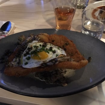 Vander Mill Grand Rapids - Pork schnitzel with an egg on top and a mushroom cream sauce - Cideries Near Me - Grand Rapids, Michigan Vander Mill Grand Rapids - Pork schnitzel with an egg on top and a mushroom cream sauce - Cideries Near Me - Grand Rapids, Michigan