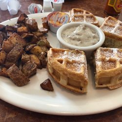 Asa's Place - Stuffed waffle with sausage and gravy, with a side of sausage and gravy.