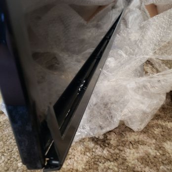 Clutter - Damaged tv, bottom corner - Self Storage Near Me