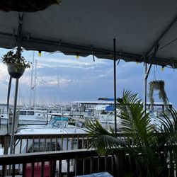 Harbor Shack - Situated on the harbor the covered decks face the boat docs. Inside dining is also available.