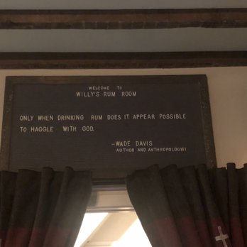 Willy's Rum Room - a sign on the wall - Cocktail Bars Near Me - Hudson, New York