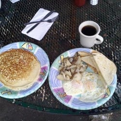 Paula's - Coffee, 2 eggs, potatoes, sourdough, pancake. $5-6. Oh yes, heaven is a tiny restaurant on the East side of Santa Cruz.