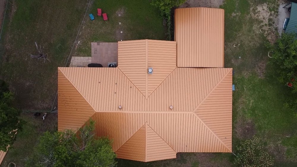 Slide of Tiger Roofing Metal & Shingles