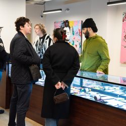 Chelsea Cannabis - Cannabis Advisors walking guests through the case at 104 7th Ave.
