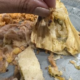 Green tamales with very little filling
