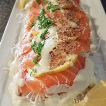 Takamatsu - New Special !!! Salmon sashimi with a horseradish cream sauce topped with seafood flakes and scallion - Japanese Near Me - Tucson, Arizona Takamatsu - New Special !!! Salmon sashimi with a horseradish cream sauce topped with seafood flakes and scallion - Japanese Near Me - Tucson, Arizona