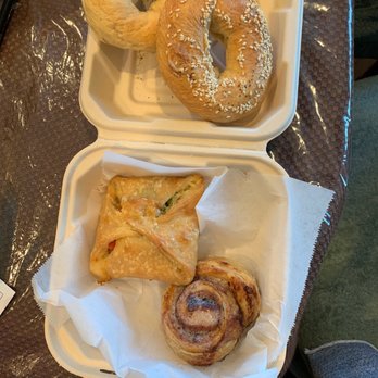 Fox and Lion Bread - From top to bottom: bagels, savory pesto tomatoe wrap, and cinnamon roll. - Pizza Near Me - San Francisco, California Fox and Lion Bread - From top to bottom: bagels, savory pesto tomatoe wrap, and cinnamon roll. - Pizza Near Me - San Francisco, California